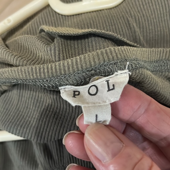 Sleeveless ribbed dress with ruffles at shoulders, skirt is partially lined. - Picture 5 of 6